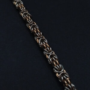 Zweifarbiges Trizantine Armband aus Edelstahl und Bronze, handgefertigt im kunstvollen Flechtdesign