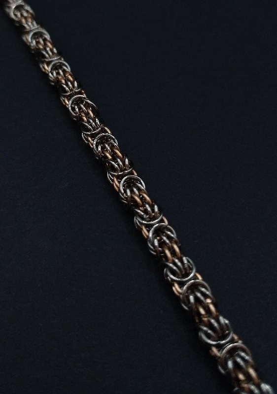 Zweifarbiges Trizantine Armband aus Edelstahl und Bronze, handgefertigt im kunstvollen Flechtdesign