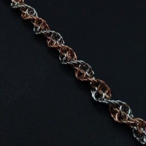 Handgefertigtes Helix Armband aus Edelstahl und Bronze mit doppelt spiralförmiger Flechtung