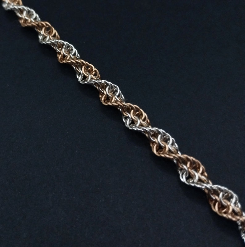 Einzigartiges filigranes Helix Armband in 935 Silber & Bronze, handgearbeitet